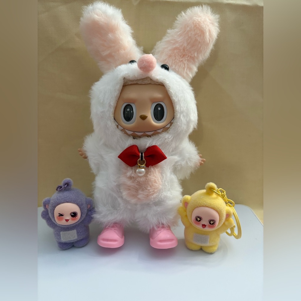 Happy Easter! Adorable Bunny outfit with two mini keychains. Doll NOT included.